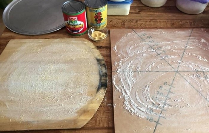 Applying flour on pizza peel